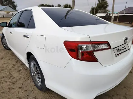 Toyota Camry 2014 года за 5 490 000 тг. в Актобе – фото 25