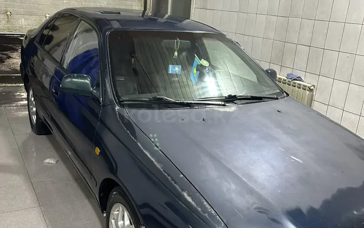 Toyota Carina E 1996 годаүшін2 000 000 тг. в Алматы