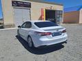 Toyota Camry 2020 года за 11 500 000 тг. в Жанаозен – фото 3