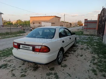 Mazda 323 1997 года за 1 500 000 тг. в Туркестан – фото 4