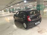 Renault Sandero 2013 года за 2 800 000 тг. в Жезказган – фото 4