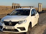 Renault Logan 2018 года за 2 900 000 тг. в Атырау – фото 2