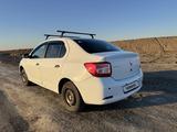 Renault Logan 2018 года за 2 900 000 тг. в Атырау – фото 5