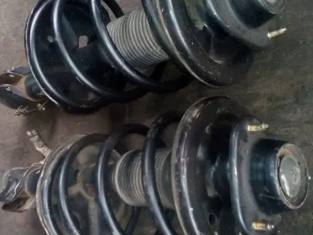 Амортизаторы передние Mitsubishi Pajero IO за 51 000 тг. в Алматы