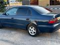 Toyota Carina E 1996 года за 1 850 000 тг. в Есик – фото 5