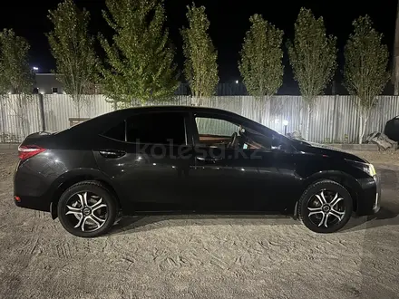 Toyota Corolla 2013 года за 4 700 000 тг. в Актобе – фото 4