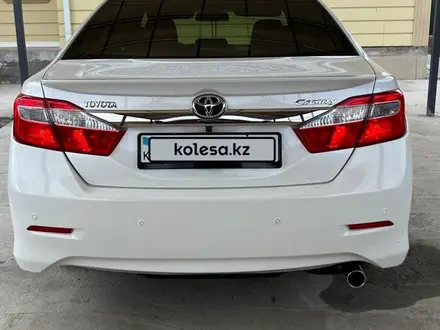 Toyota Camry 2014 года за 8 200 000 тг. в Атырау – фото 2
