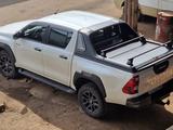Шторка жалюзи и спойлер Hilux за 600 000 тг. в Алматы – фото 2