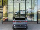 Volkswagen ID.4 2023 года за 9 890 000 тг. в Алматы – фото 5