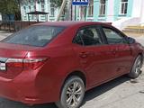 Toyota Corolla 2014 года за 6 000 000 тг. в Астана – фото 2