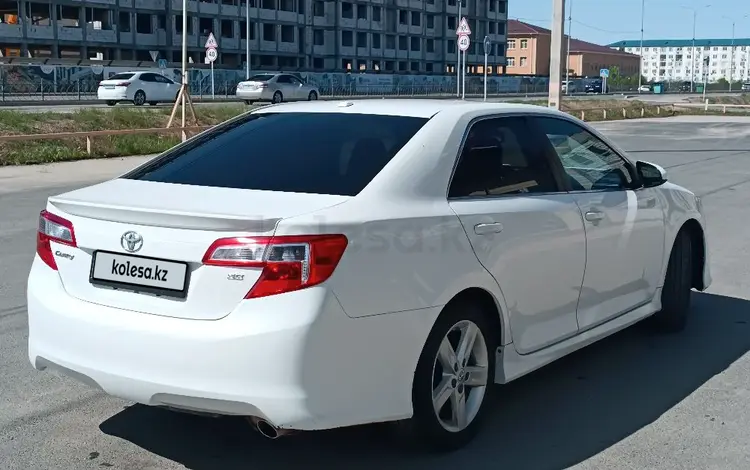 Toyota Camry 2013 года за 8 680 000 тг. в Атырау