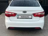 Kia Rio 2014 года за 4 600 000 тг. в Жетысай – фото 3