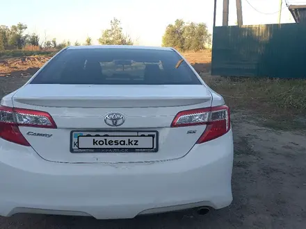 Toyota Camry 2013 года за 9 000 000 тг. в Уральск – фото 3