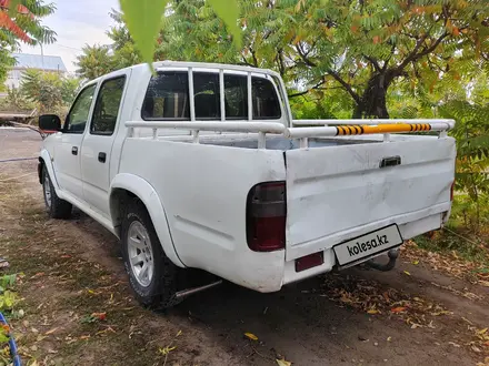 Toyota Hilux 2004 года за 4 000 000 тг. в Узынагаш – фото 3