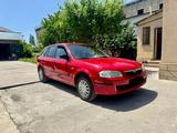Mazda 323 2000 года за 2 499 999 тг. в Шымкент – фото 5