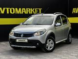 Renault Sandero 2013 года за 3 390 000 тг. в Актобе