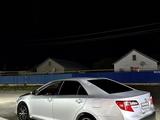 Toyota Camry 2014 года за 5 600 000 тг. в Атырау