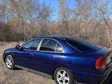Mitsubishi Carisma 1996 года за 1 200 000 тг. в Астана – фото 2