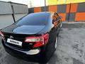 Toyota Camry 2014 года за 7 800 000 тг. в Уральск – фото 5