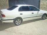 Toyota Carina E 1997 годаүшін1 350 000 тг. в Жанаозен – фото 2