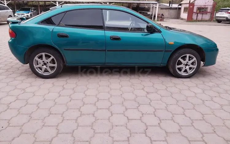 Mazda 323 1995 годаүшін1 550 000 тг. в Караганда