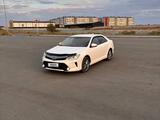 Toyota Camry 2014 года за 10 200 000 тг. в Актобе – фото 2