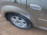 Renault Logan 2012 года за 1 900 000 тг. в Астана – фото 2
