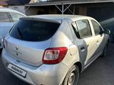 Renault Sandero 2015 года за 2 300 000 тг. в Караганда – фото 4