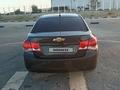 Chevrolet Cruze 2010 года за 1 900 000 тг. в Аральск – фото 5