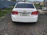 Chevrolet Cruze 2011 года за 2 700 000 тг. в Астана – фото 2