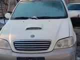 Kia Carnival 2001 годаfor1 300 000 тг. в Шымкент