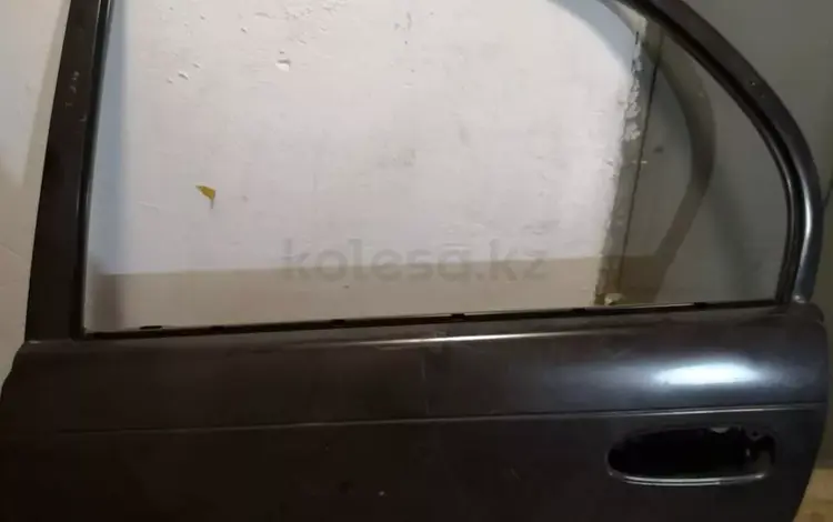 Задняя левая дверь на Toyota Corolla 100 седанүшін20 000 тг. в Алматы