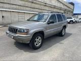 Jeep Grand Cherokee 2001 годаүшін3 900 000 тг. в Шымкент – фото 2