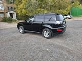 Mitsubishi Outlander 2012 года за 6 100 000 тг. в Караганда – фото 3