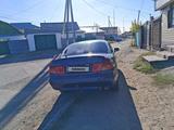 Mitsubishi Carisma 1996 года за 1 100 000 тг. в Астана – фото 2