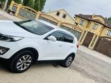 Kia Sportage 2014 года за 8 200 000 тг. в Актобе – фото 2
