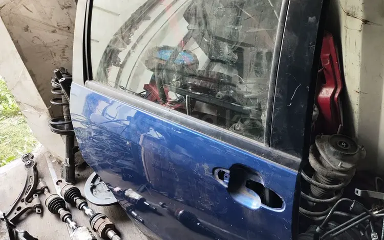 Дверь MAZDA за 35 000 тг. в Астана