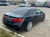 Toyota Camry 2014 годаүшін7 600 000 тг. в Актау – фото 4