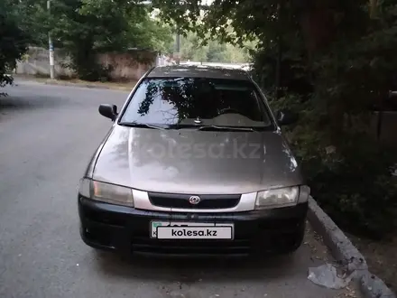 Mazda 323 1997 года за 750 000 тг. в Шымкент – фото 12