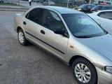 Mazda 323 1997 года за 1 050 000 тг. в Астана – фото 5