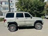 УАЗ Patriot 2014 года за 2 950 000 тг. в Уральск – фото 5