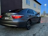 Toyota Camry 2015 года за 6 600 000 тг. в Уральск – фото 3