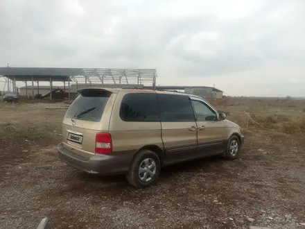 Kia Carnival 2001 года за 1 600 000 тг. в Алматы – фото 4