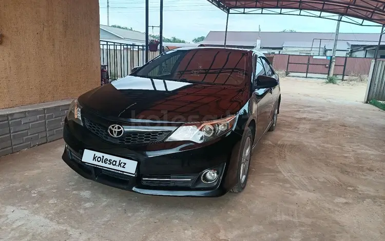 Toyota Camry 2014 года за 8 500 000 тг. в Атырау