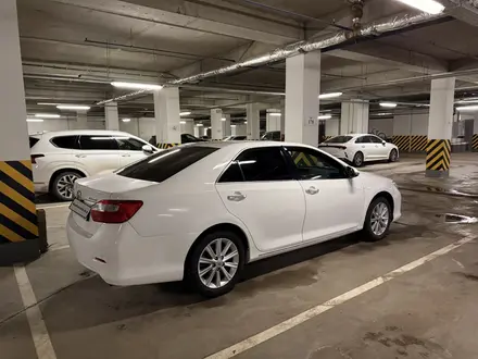 Toyota Camry 2014 года за 9 800 000 тг. в Астана – фото 23