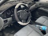 Nissan Almera 2012 года за 2 950 000 тг. в Атырау – фото 5