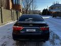 Toyota Camry 2015 года за 6 600 000 тг. в Актобе – фото 4