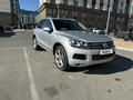 Volkswagen Touareg 2012 годаүшін8 600 000 тг. в Атырау