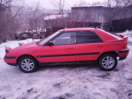 Mazda 323 1993 года за 900 000 тг. в Алматы – фото 2