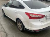 Ford Focus 2013 года за 2 400 000 тг. в Актобе – фото 2